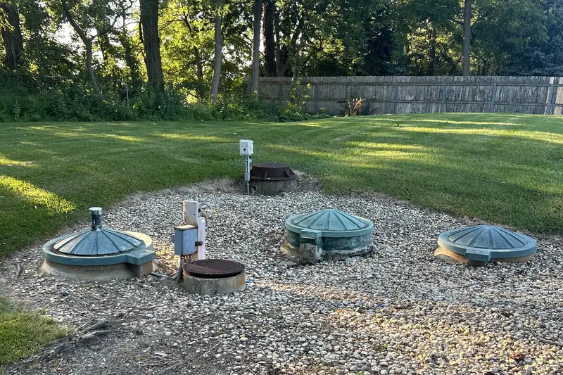 Full septic system with tidy riser lids after service